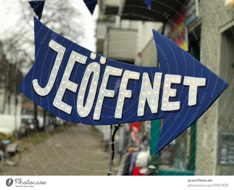 Sign with lettering "Jeöffnet" - shop is open Photo: Alexander Hauk sign Cologne Berlin lockdown lockdown light covid19 corona Trade Economy Commerce business