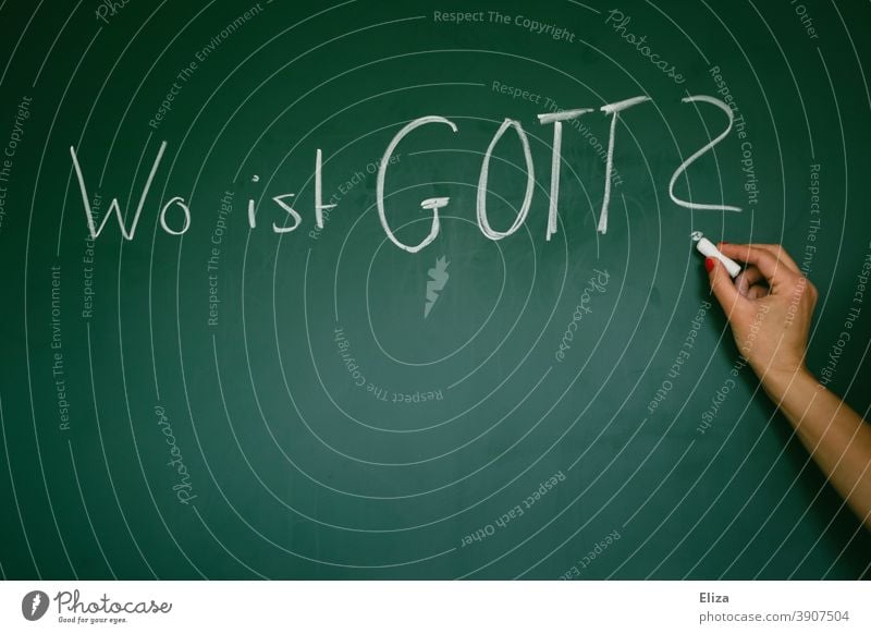 The question "Where is God?" written with chalk on a green board religion believe question of faith godlessness where is god atheism Agnostic Hand Chalkboard