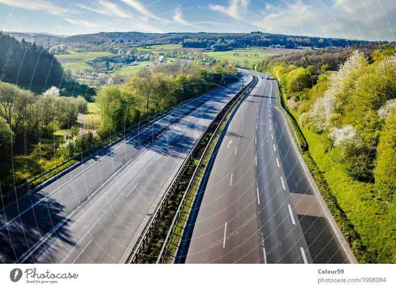 Autobahn landscape germany highway travel speed vehicle car road traffic motion asphalt transport motorway autobahn drive sky freeway street transportation