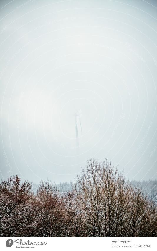 Windmill in the fog Pinwheel wind farm Fog Shroud of fog Misty atmosphere Fog bank Cloud forest Wall of fog Covering of fog Wind energy plant Exterior shot