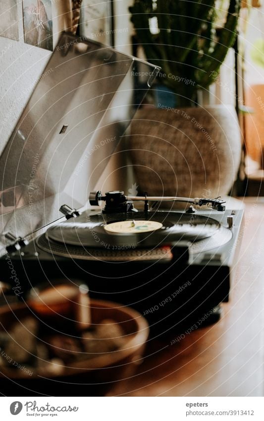 Record player in a cosy home disk place a record Cozy Wood interior Lifestyle furnishing Music play music Sync and corrections by n17t01 Furniture