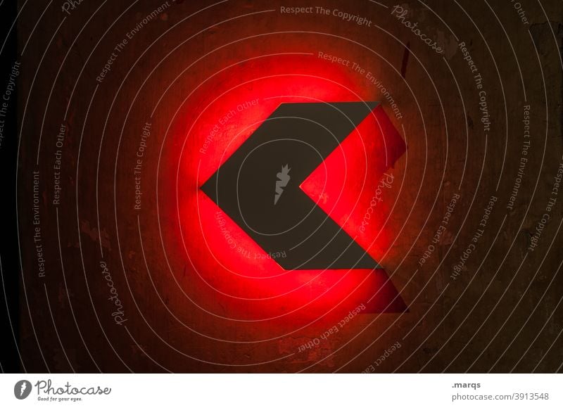 arrow Arrow Red Left Lanes & trails Signs and labeling Direction Orientation Colour Backward Beginning Design Style Dark Road marking Navigation Clue