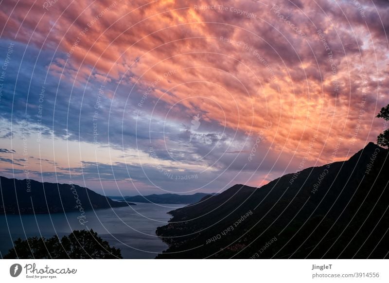 Sunburn Clouds sunset Sky Evening Moody Red Blue Gold Black Silhouette warm Exterior shot Ocean Colour photo Deserted Nature Water Twilight evening mood