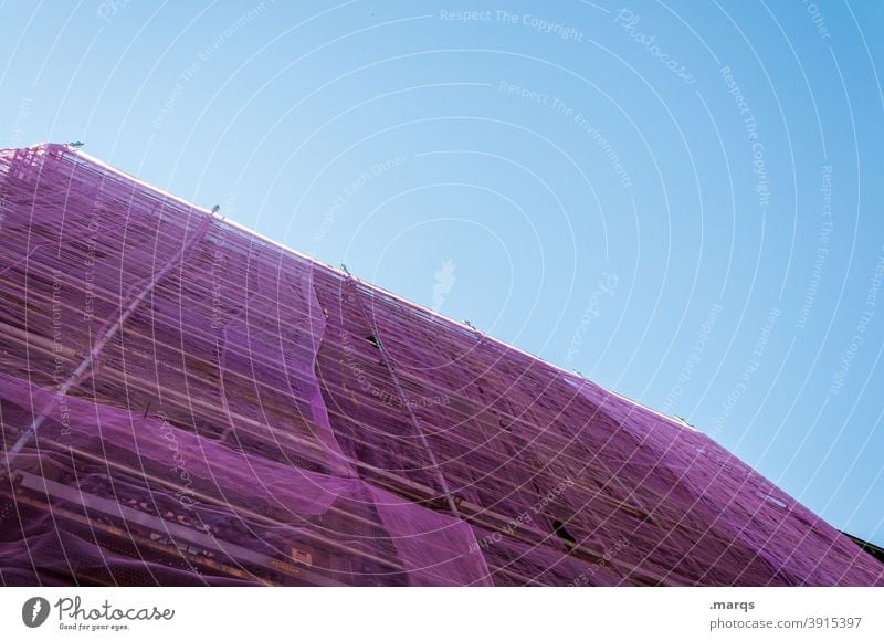 Purple wrapped scaffolding safety net Scaffold Envelop Violet Plastic Sky Modernization Construction site Architecture Building Beautiful weather Protection