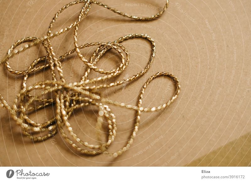 Golden cord String golden Gift wrapping Brown parcel string glittering Chaos entangled gobbled