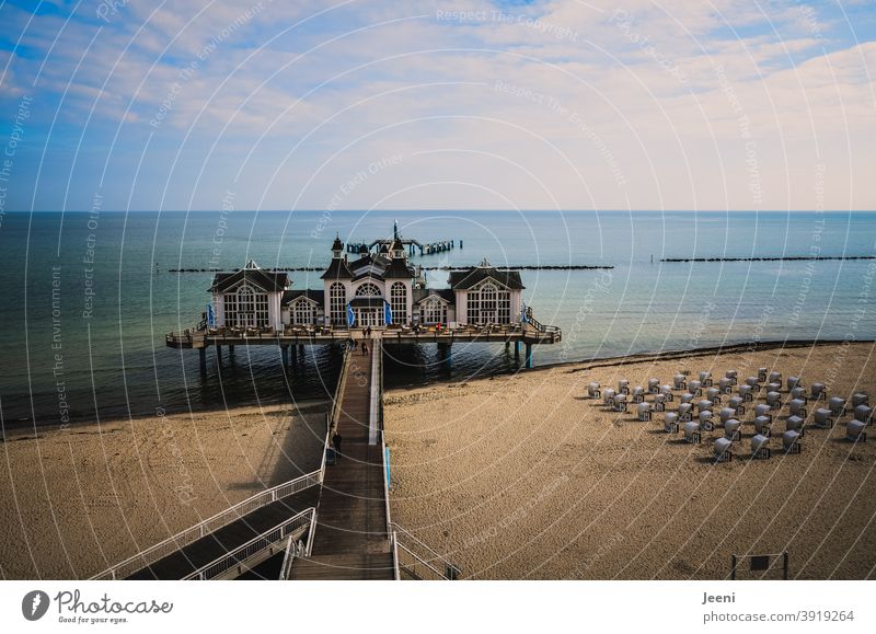 Baltic Sea pier | blue sky with clouds | beach with beach chairs Sea bridge Sellin Baltic coast Island Rügen Calm Vacation & Travel Tourism Trip Nature Ocean