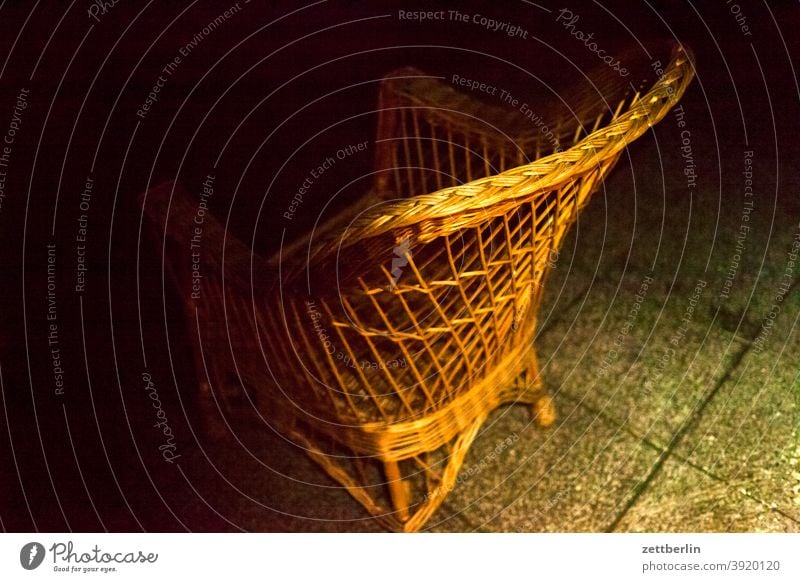 Wicker chair in the ISO test Background picture Branch Tree Dark Relaxation holidays Garden Autumn allotment Garden allotments Deserted Night tranquillity