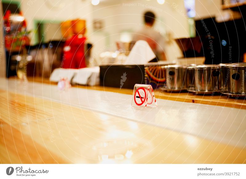 no smoking sign on bar table forbidden symbol warning sign horizontal safety cigarette color image danger photography restaurant cancer information health