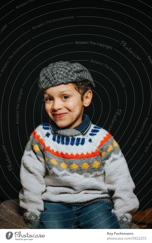 studio portrait of cute black boy smiling african american boys carefree casual clothing child childhood children cold emotion expression freedom happiness