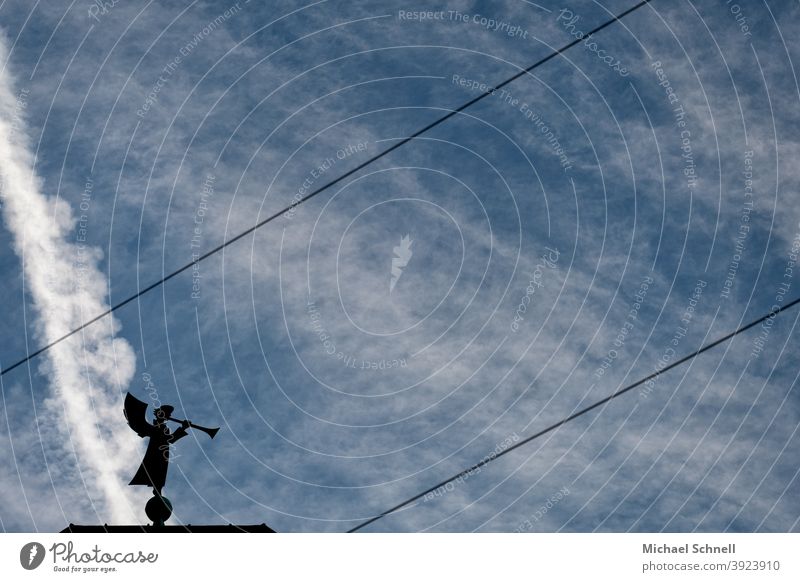 Wind, tuba or trombone angel on the roof of a church Music Angel Bladder Angel Tuba Angel Trombone Angel Sky Grand piano Clouds Statue Exterior shot