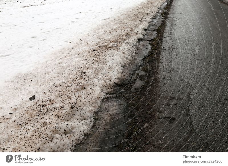 Snow and dirt next to road in Black Forest Street filth Asphalt White Damp Glittering frowzy Dirty Deserted Traffic infrastructure