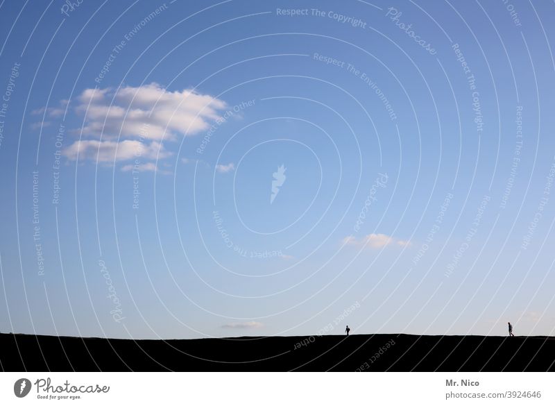 Two hikers keep their distance from each other Clouds Sky Human being Silhouette Shadow Black Blue sky image Light and shadow To go for a walk strollers