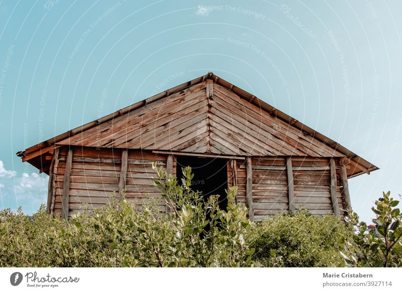 Low angle view of a traditional wooden salt storage house in Kampot Cambodia which is a popular tourist attraction and local livelihood of the khmer people