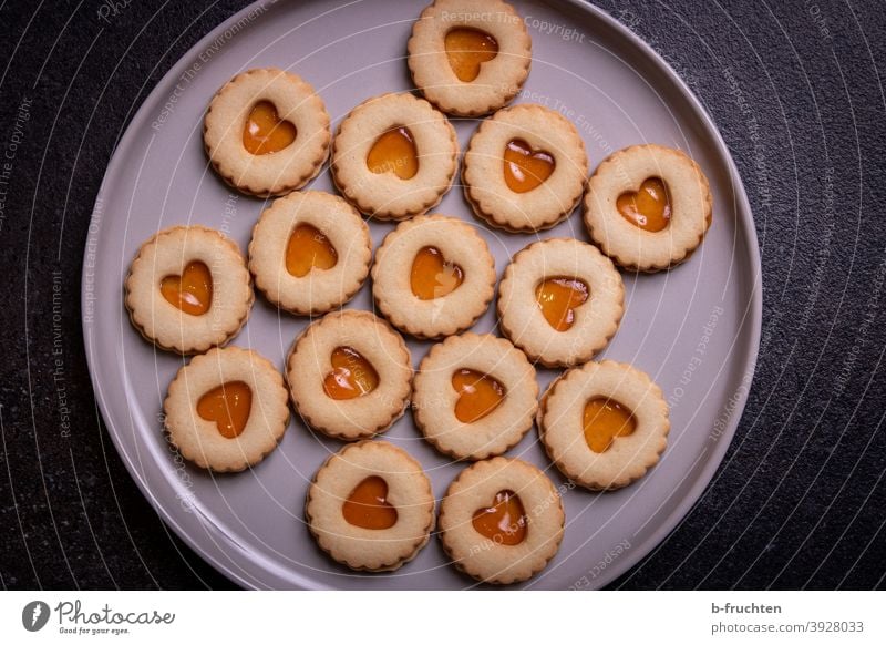 Favorite cookies filled with jam. Christmas cookies, biscuits with delicious filling Christmas biscuits Baked goods cute Cookie Baking Delicious