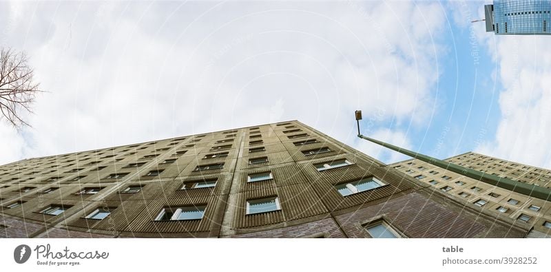 View upwards along the façade of a prefabricated building into the sky above Berlin urban High-rise facade Line Symmetry Modern architecture Town Abstract