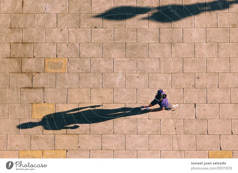 tourist walking on the street visiting Bilbao city, Spain tourism person people human pedestrian shadow silhouette outdoors action travel destination bilbao