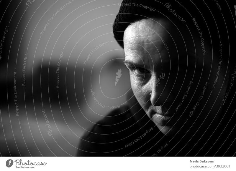 portrait of a woman in black beanie Portrait photograph Looking into the camera look look into the camera Face Black & white photo Feminine Human being Woman