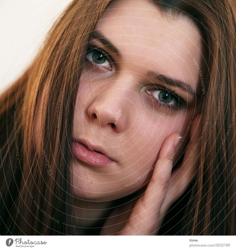 Natalia Meditative concentrated Hand Rest on Brunette brown-haired Long-haired Looking portrait