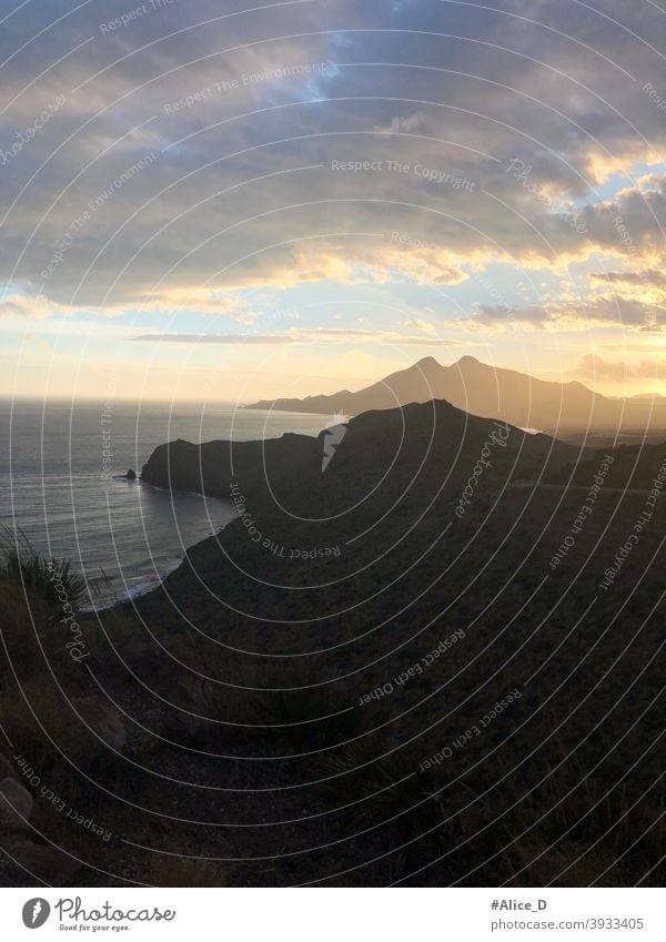 Silhouette coastal landscape in Cabo de Gata Natural Park Andalusia at sunset spain Almeria nijar natural park dusky sunlight shining Skirt seascape europe