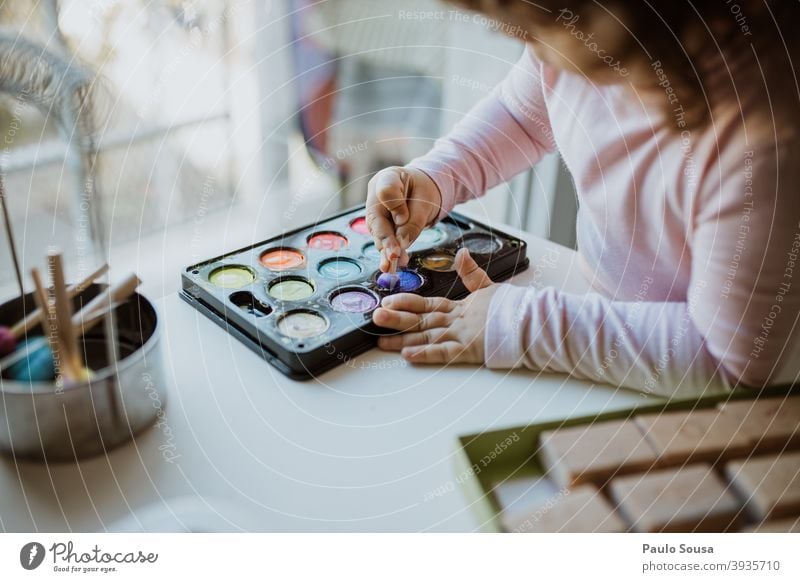 Child playing with watercolor Watercolor Painting and drawing (object) Leisure and hobbies Painter Paper Draw Paintbrush Multicoloured Colour photo