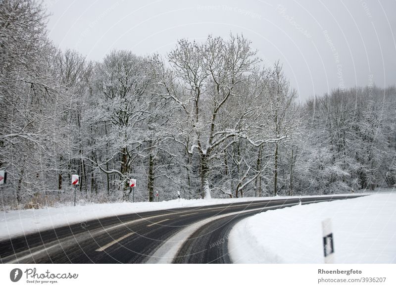 dangerously slippery road with snow drifts Street Country road Federal highway Transport Road traffic Snow smooth Smoothness Winter onset of winter Traffic lane