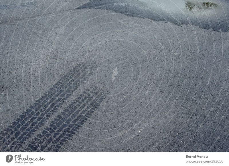 Volatile phenomenon II Parking lot Asphalt Car Gray Black Structures and shapes Tracks Skid marks Tire tread Parallel Wet Puddle Summer Steam Fleeting Depart