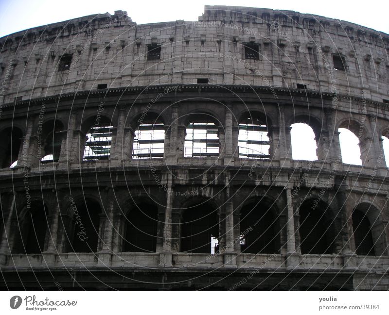 Colosseum Black & white photo Rome Vacation & Travel Culture Historic Sky Manmade structures Restoration Window Column Arch Theatre Town Architecture