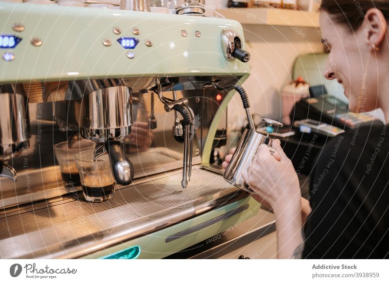 Barista making coffee in machine prepare woman barista cafe drink make cafeteria professional female beverage job work service employee device occupation staff