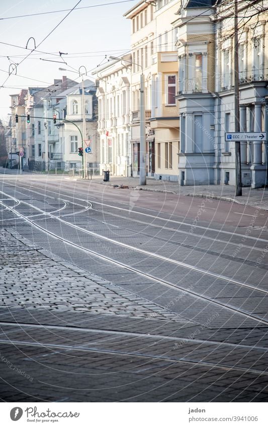 empty streets (34). Street Deserted Town Window Railroad tracks tram tracks row of houses Facades Overhead line Curve Signs and labeling Traffic light