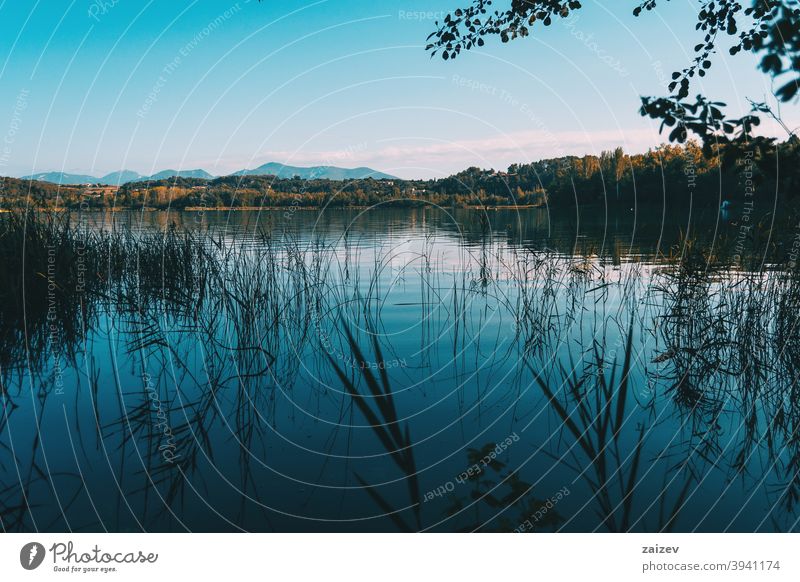 View of Banyoles Lake, in Gerona (Catalonia, Spain) peaceful relaxing calmness colours tranquility pure stage paradise quiet junk lagoon outside spanish