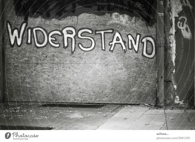 Resistance. Being against it first. resistance opposition Graffiti Wall (building) Characters Text Letters (alphabet) countermovement anti policy Word