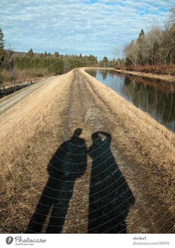 Shadows at the canal Autumn Bend Isar November Bavaria River Sewer Couple Lanes & trails Water In pairs