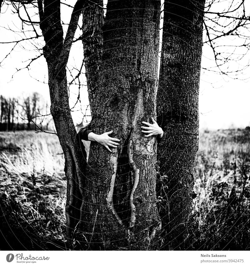 open slightly tree hands human fingers black and white monochrome sharp harsh dance Symbolism symbolic power Symbols and metaphors landscape posing no face