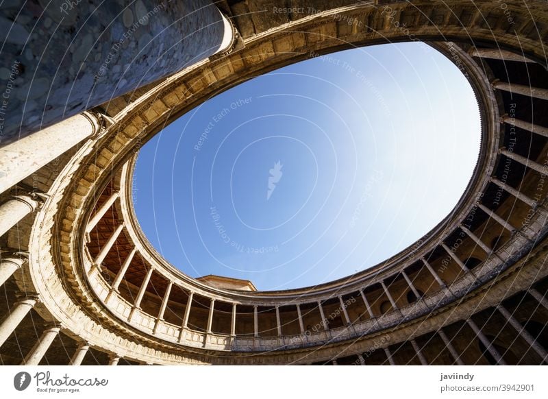 Interior of the Palace of Carlos V in the Alhambra in Granada alhambra carlos charles v granada palace courtyard spain spanish architecture landmark stone