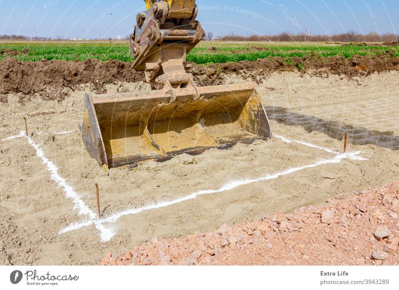 Excavator will dig precise inside marked area at building site Accurate Alignment Arm Backhoe Border Boundary Bucket Building Site Chalk Civil Engineering