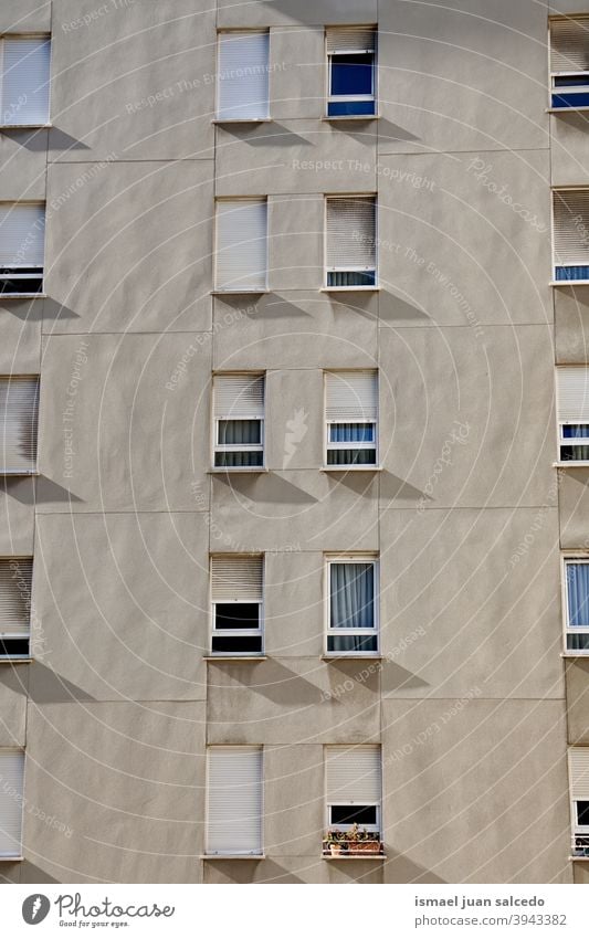 windows on the white facade of the house, architecture in Bilbao city Spain building exterior building sterior home street outdoors structure built structure