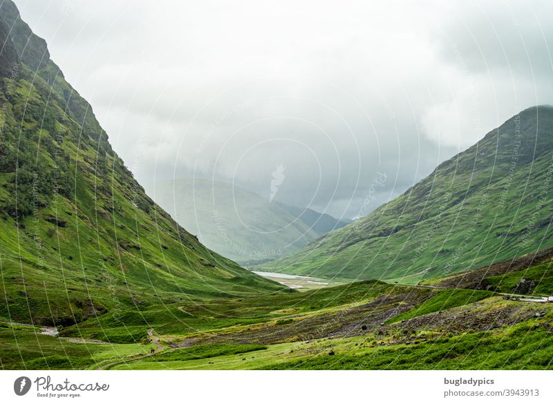 Green hills covered with clouds Mountain mountains Hill hilly mountainous Landscape Nature Meadow Clouds Grass highlands Rain Dreary Scotland Hiking Calm