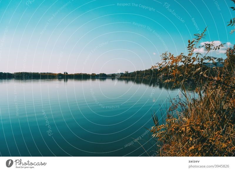 View of Banyoles Lake, in Gerona (Catalonia, Spain) peaceful relaxing calmness colours tranquility pure stage paradise quiet junk lagoon outside spanish