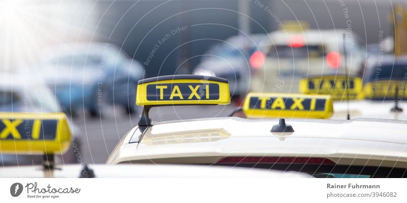 Several taxis waiting for passengers at the roadside Taxis Town Transport Street Berlin Capital city Deserted Copy Space City life Downtown Berlin Tourism