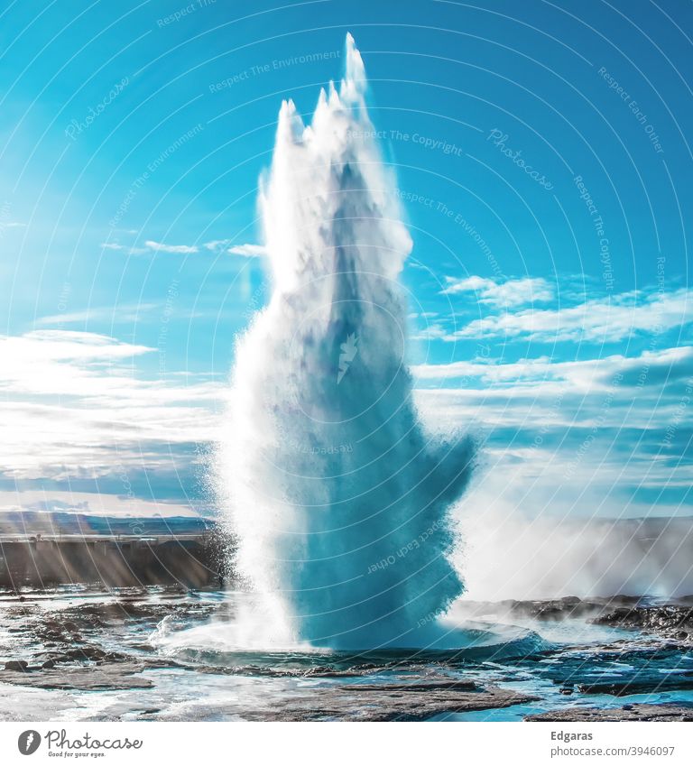 Geyser eruption in Iceland Eruption Geyser Iceland Water Power Travel sunny day Moment Winter Snow Cold Tourism Travel photography