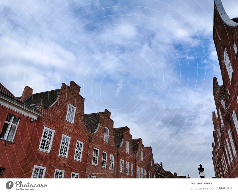 Houses in the Dutch quarter of Potsdam in Brandenburg Dutch Quarter Middle Street houses Building style Brick Red Blue sky Tourist Attraction Capital city Sky