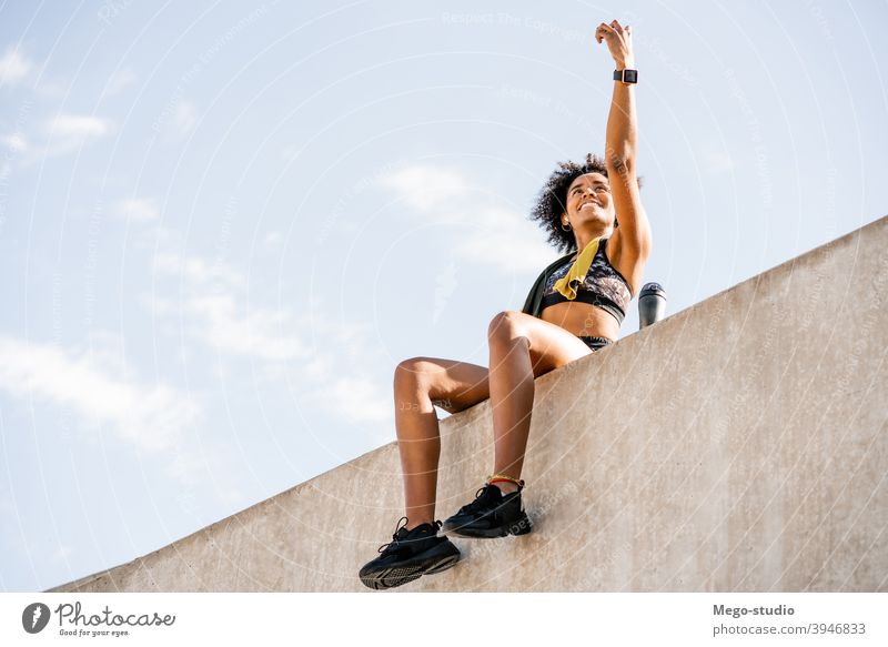 Athlete woman taking a selfie with phone outdoors. athlete fitness mobile gym rest relax active portrait gadget activity urban sporty sportswoman app city