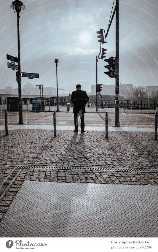 A man casts his shadow. In the background the German Bundestag on a foggy day. Downtown Tourism Capital city Deserted City urban Town Lure of the big city