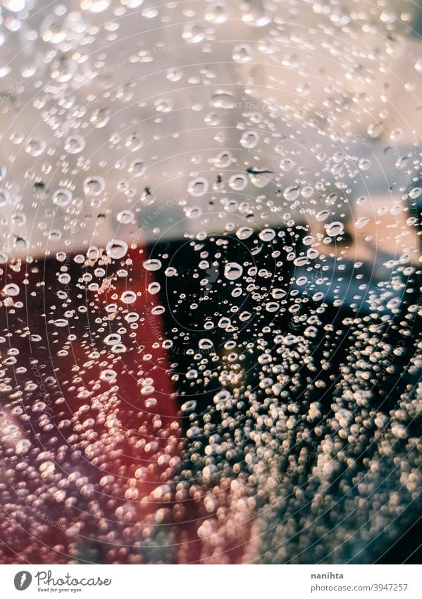 Vibrant background of water drops in a shower abstract texture bokeh depht of field lights contrast vibrant cool clean dark backdrop wallpaper intense no people