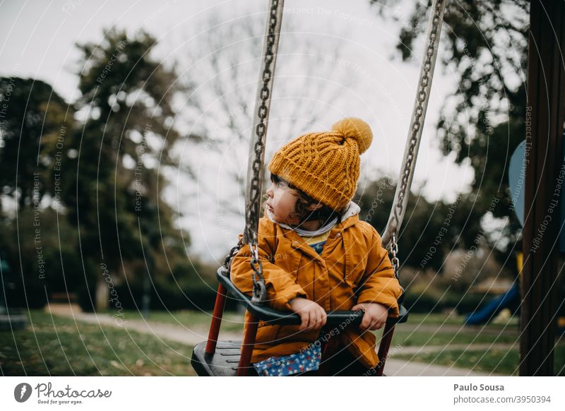 Child playing in the playground Slide Playground Park having fun Playing Joy Infancy Exterior shot park childhood Leisure and hobbies Kindergarten Colour photo