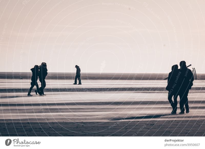 Noon in San Peter-Ording on the beach with shades of people VII Wide angle Panorama (View) Long shot Worm's-eye view Deep depth of field Sunrise Sunlight