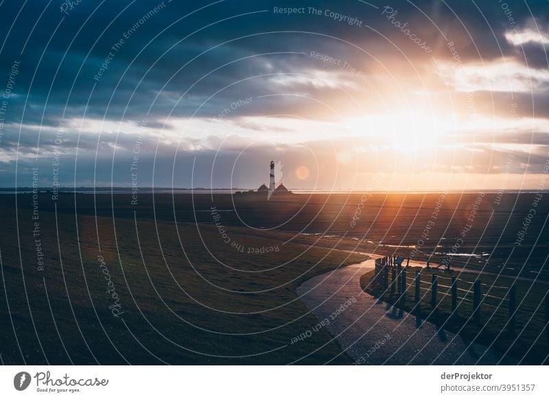 Sunset at the lighthouse Westerheversand on the peninsula Eiderstedt III Wide angle Panorama (View) Long shot Worm's-eye view Deep depth of field Sunlight