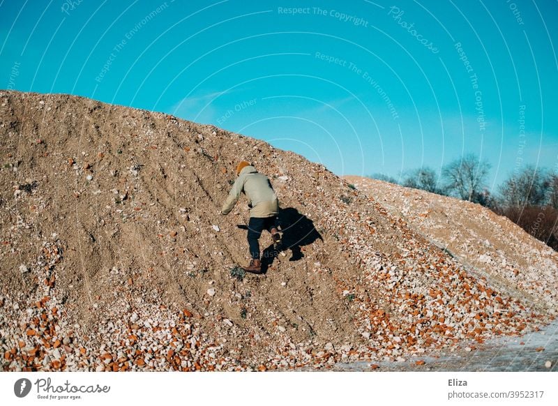 Now hurry... | Climb the hill! Hill Climbing Gravel Man climb mountain Tall Human being slippery Blue sky