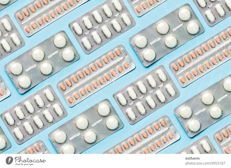 Geometric pattern made with blister with white tablets and painkillers.Concept of medicine healthcare therapy clinical depression drug abuse health care