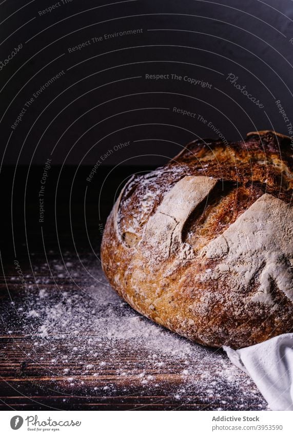 Freshly baked bread on table crust bakery fresh food tradition bakehouse loaf kitchen culinary rustic wooden napkin gourmet pastry gastronomy healthy natural